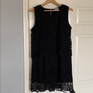 J Gee Black Lace sleeveless romper with shorts.